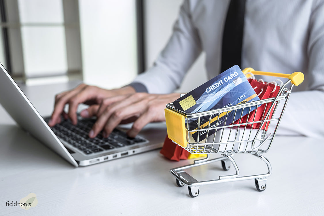 Man Using Laptop to Make Online Order