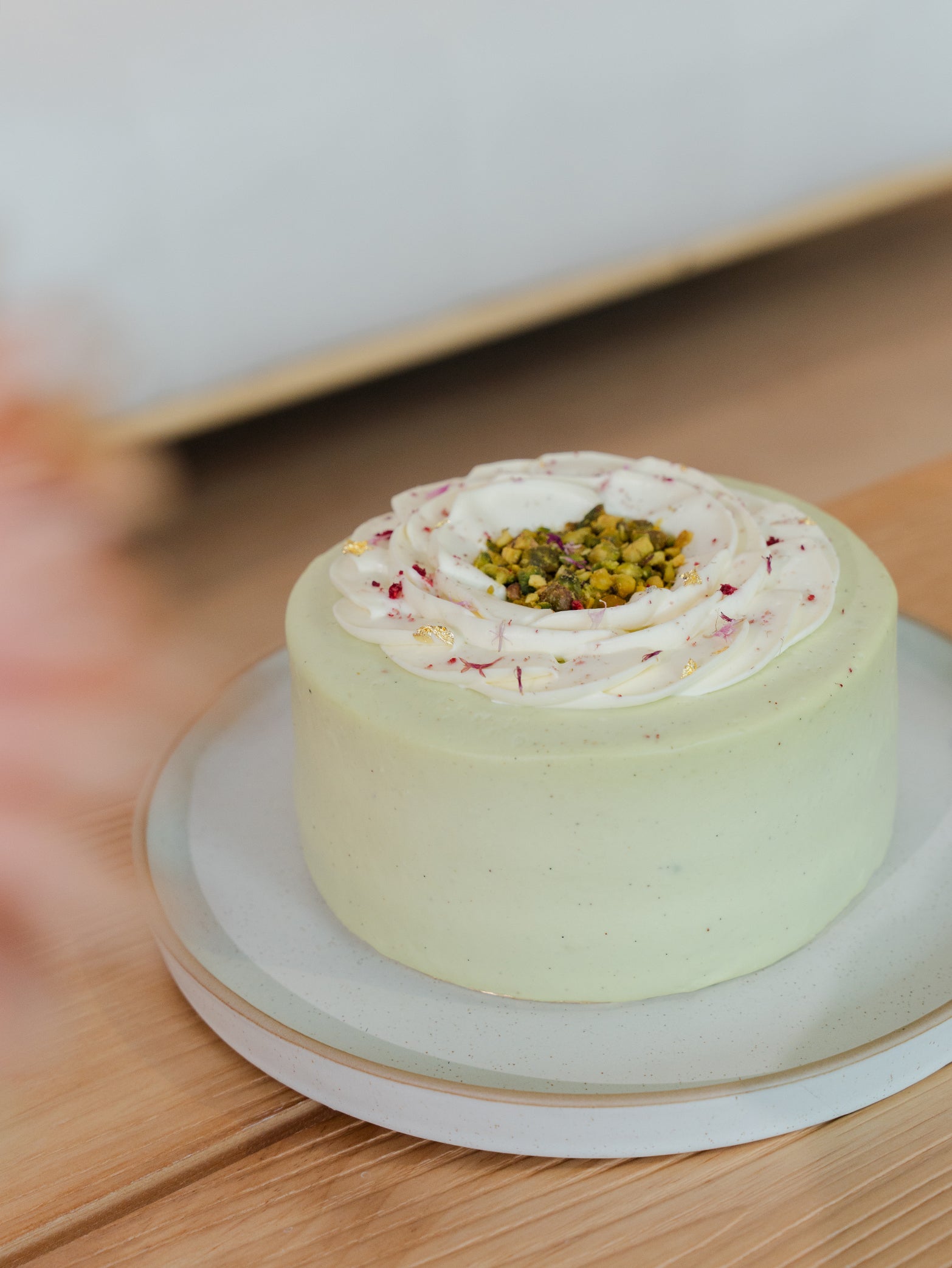 A Pistachio Praline nutty cake available for online order for delivery in Singapore