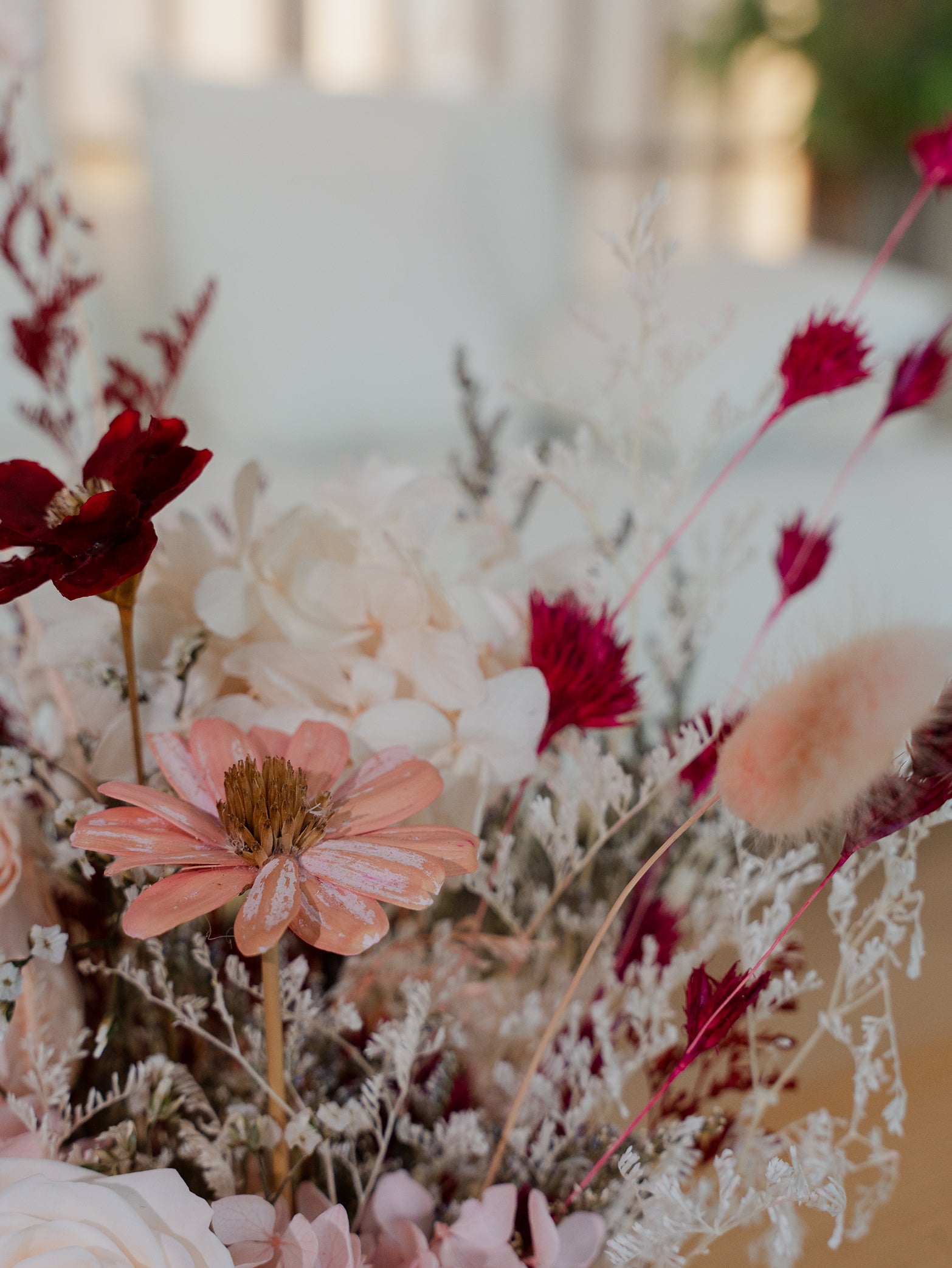 A preserved floral bouquet featuring roses and a mix of dried blooms, available for online order for islandwide delivery in Singapore