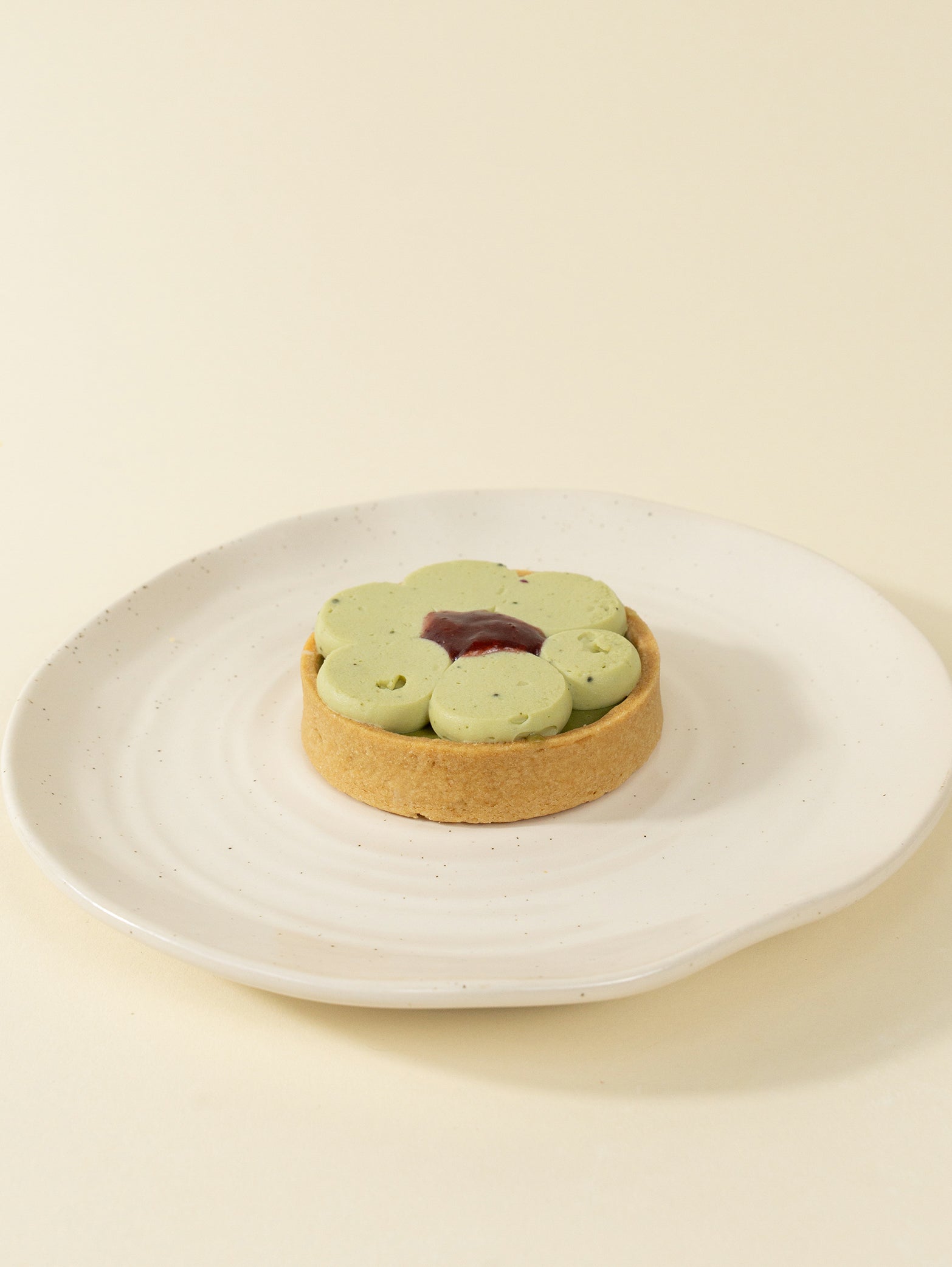 Buttery tarts filled with whipped Genmaicha infused Ganache and fresh Strawberry Compote for online order in Singapore