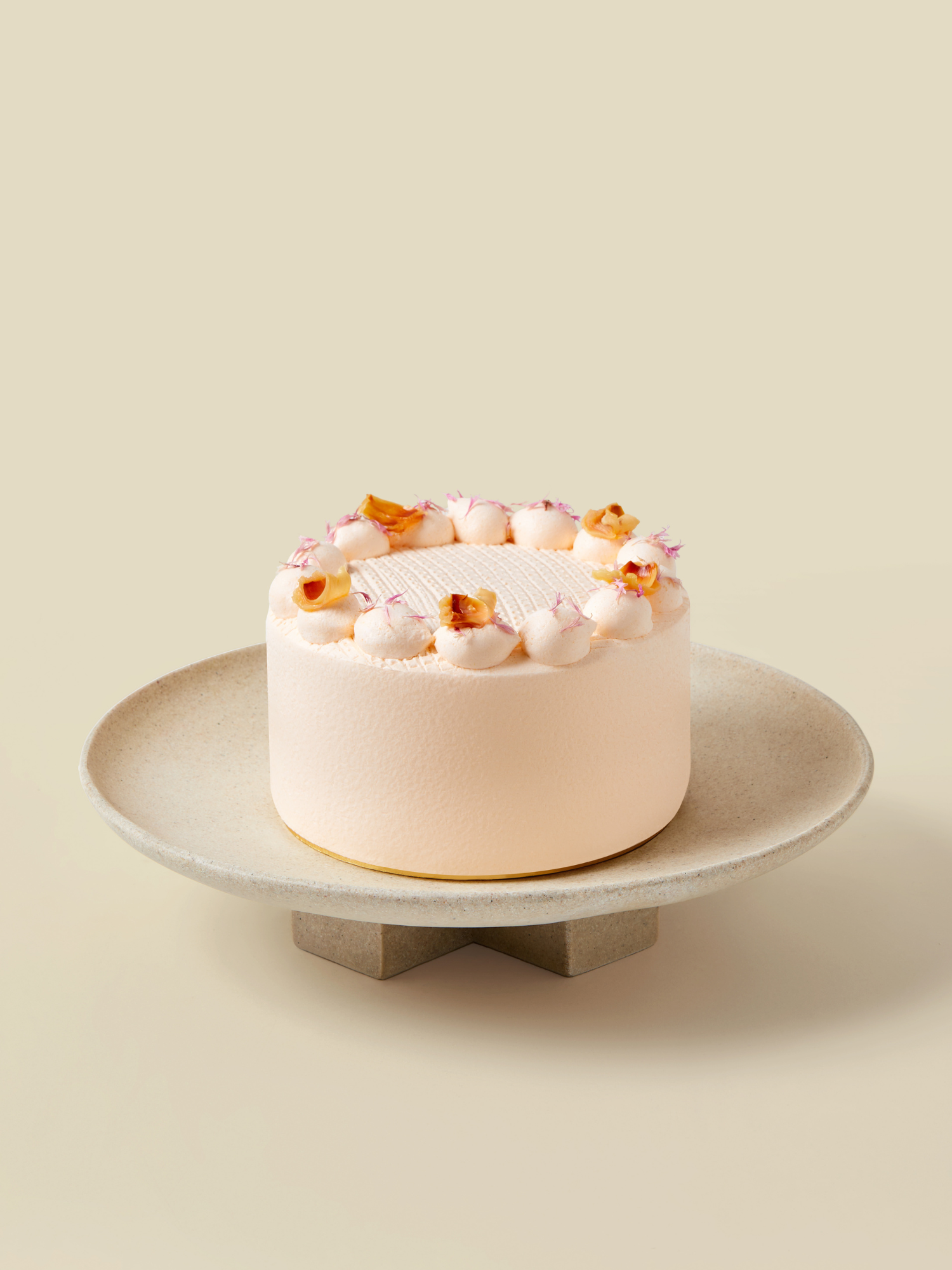 Melon sponge layered with melon fresh cream and lychee bits, available for online delivery in Singapore