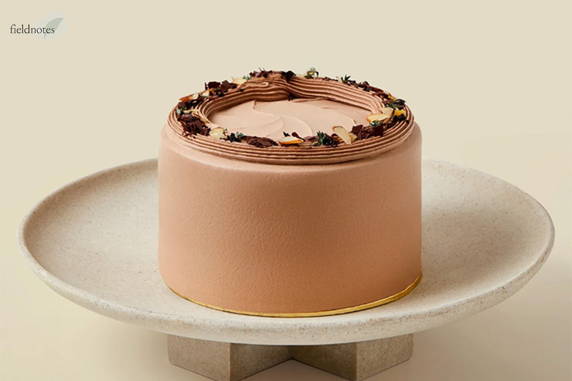 Chocolate cake on an elevated stand