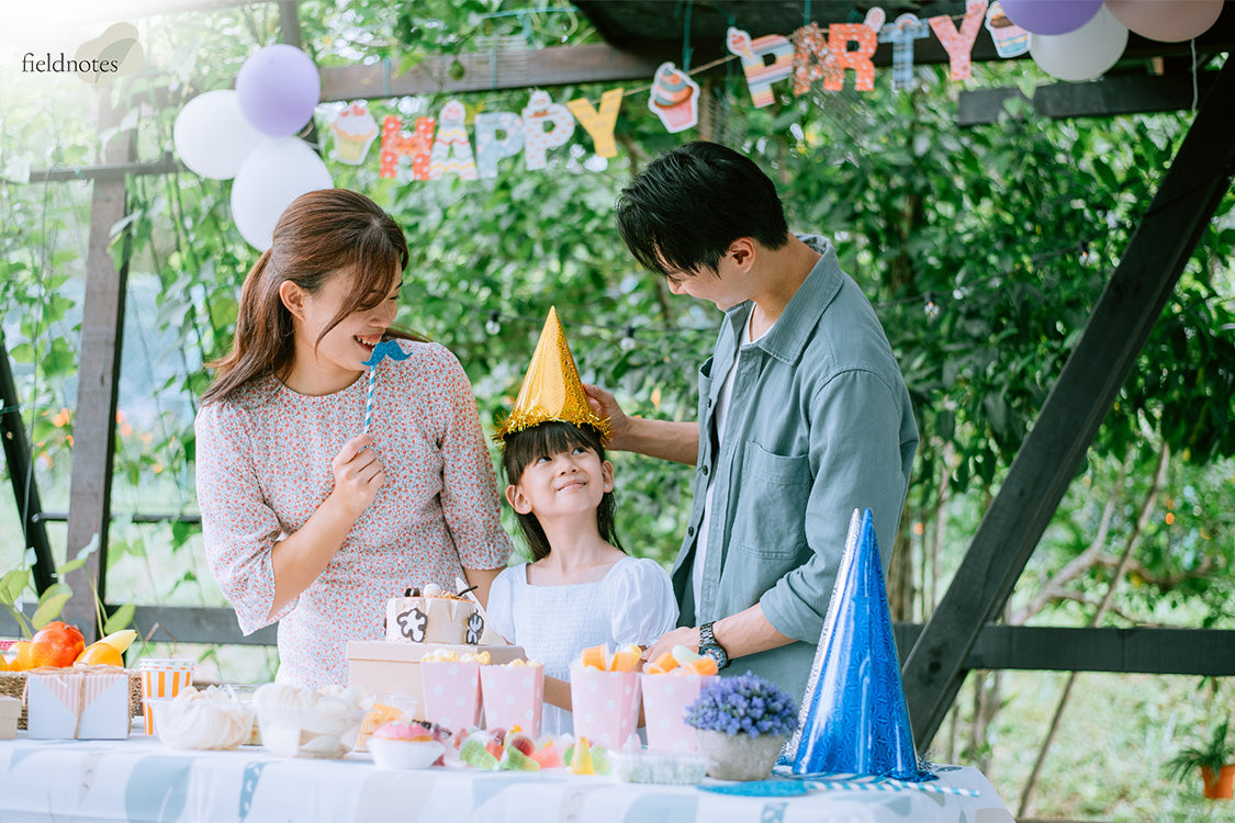 Family Celebrating daughter's birthday