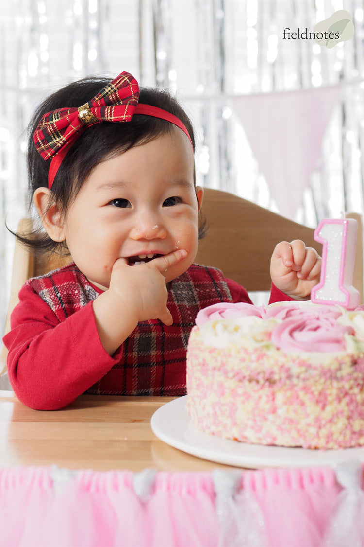 Image of a baby celebrating her first birthday